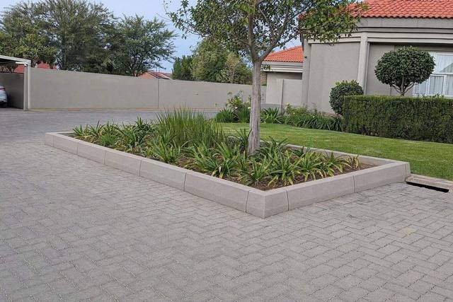 Barrier kerbs in Natural grey