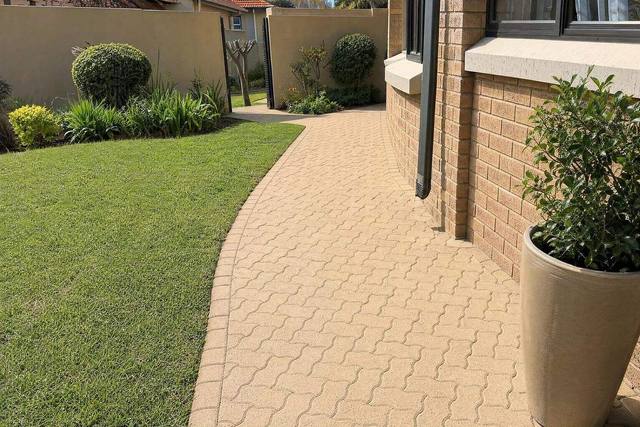 Wet cast interlocking pavers in Sandstone tan
