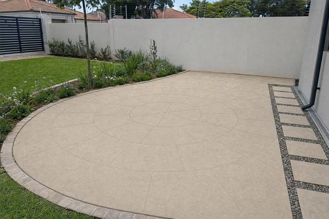 Paving circles in Sandstone tan light