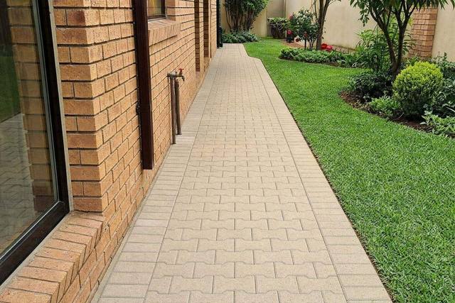 Wet cast interlocking pavers in Sandstone tan light