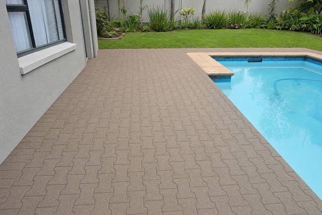 Wet cast interlocking pavers in Chocolate